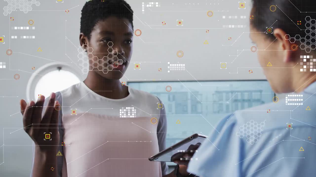 Animation of icons over diverse female coworkers talking