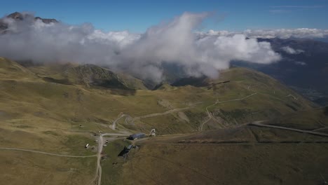 Low-clouds-over-Col-du-Portet-on-sunny-day,-France