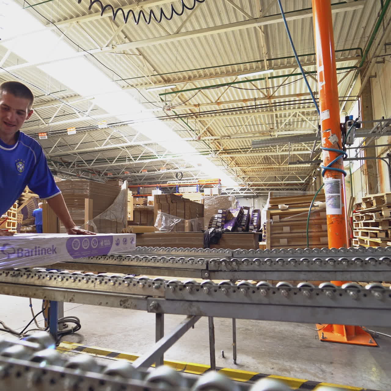 Industrial equipment for the production of laminate. Furniture factory production line.The factory for the production of laminate.