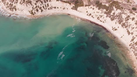 aerial drone video from eastern malta, marsaxlokk area, il-hofra l-kbira bay