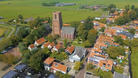 backward travel above traditional dutch village ransdorp and it's spireless church