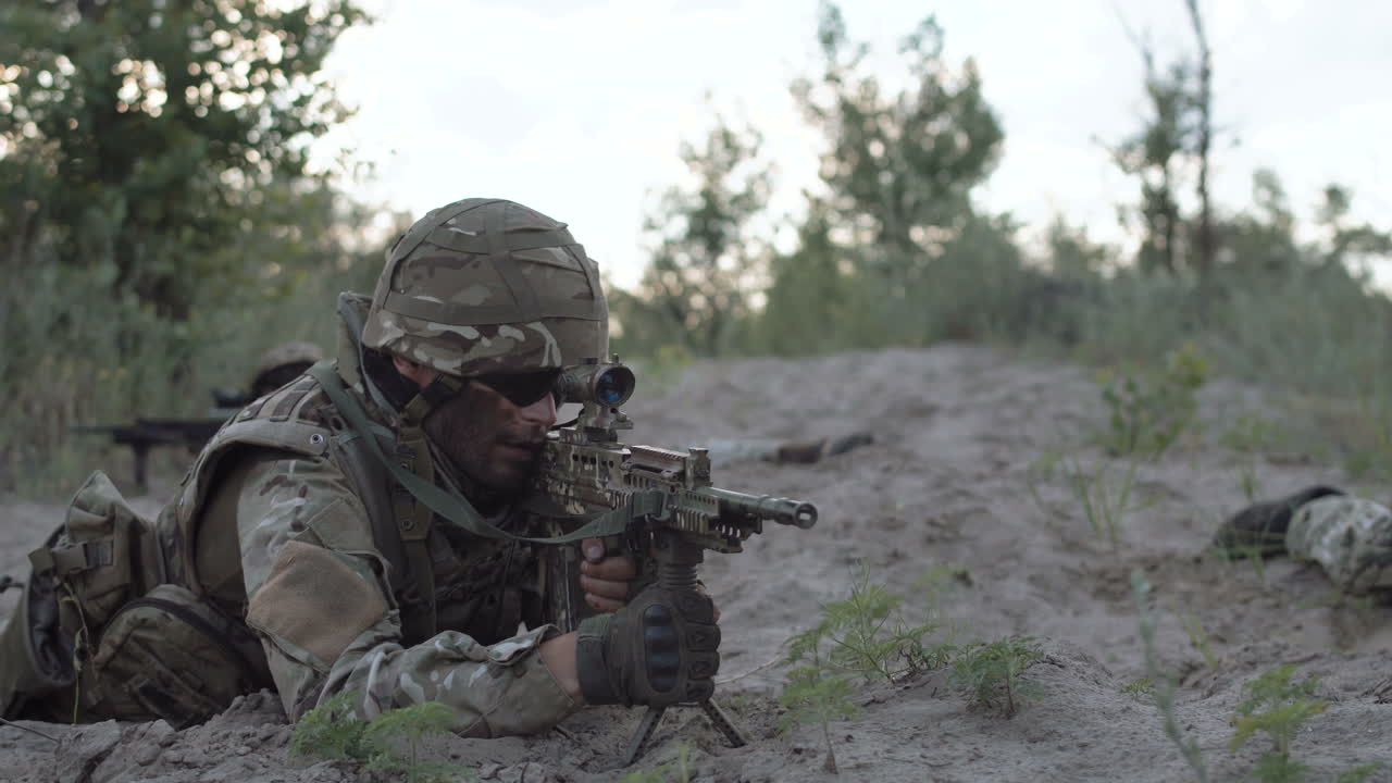 Soldiers in Camouflage on a Battlefield