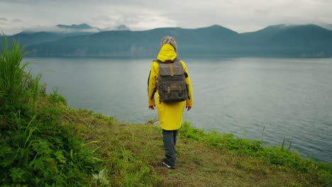 woman hiking by the lake