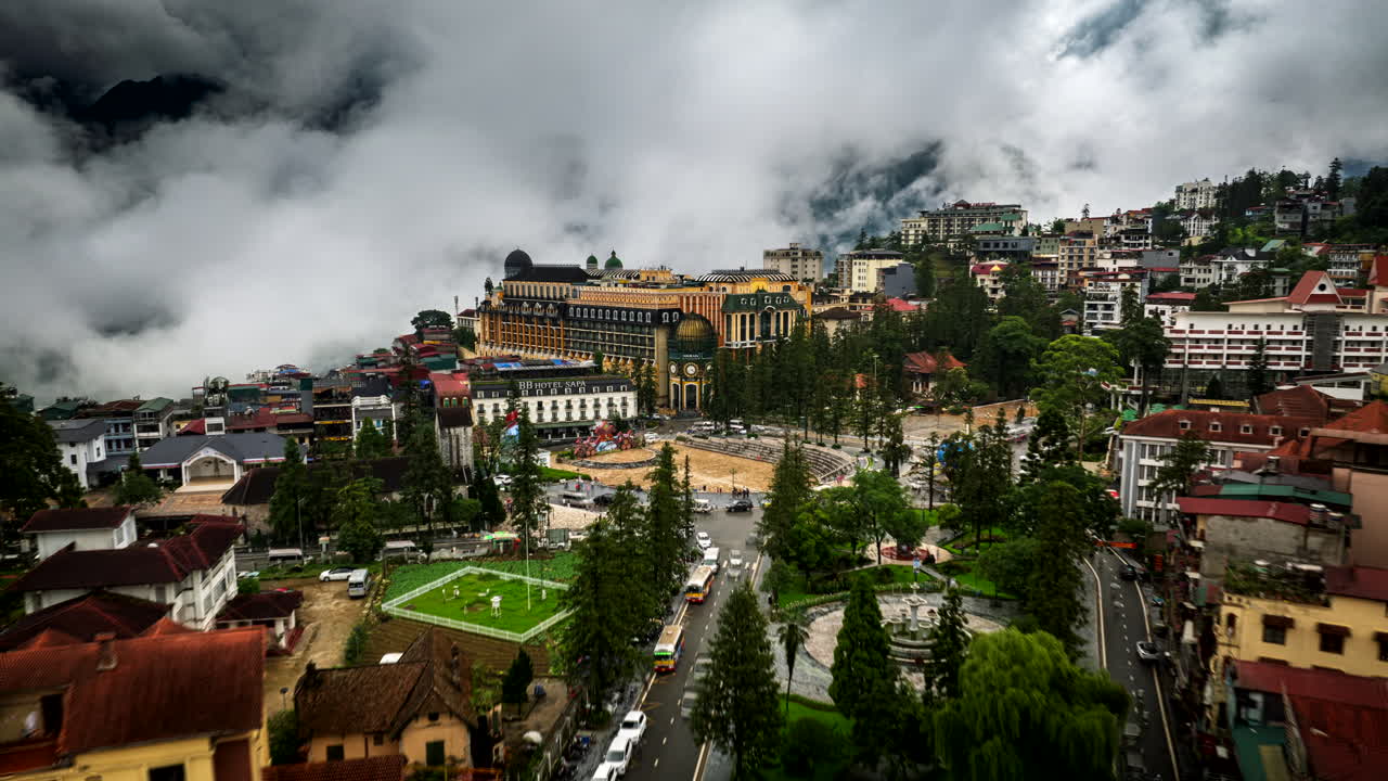 Mountain fog swirling in Sapa city Northern Vietnam, aerial pullback hyperlapse