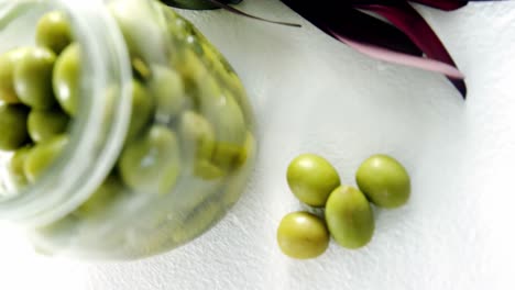 Jar-of-pickled-olives-and-olive-leaves