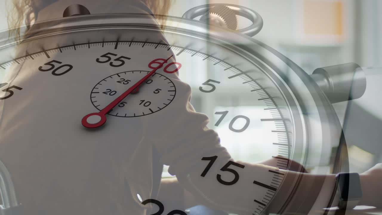 Stopwatch appearing at 58s mark initiating woman leaning forward typing on laptop showing tech time