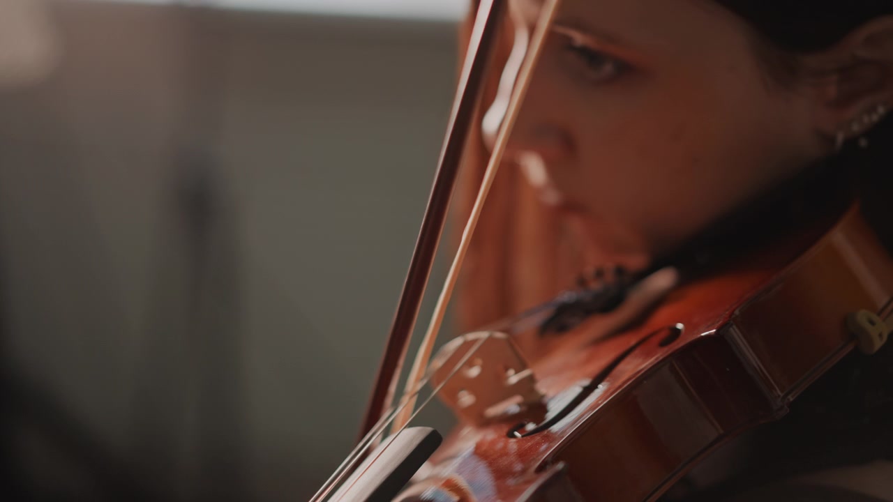 Crafting melodies through skillful finger movements and polished wood. Artisans skillfully generate alluring melodies using delicate finger techniques on glossy wooden musical instruments