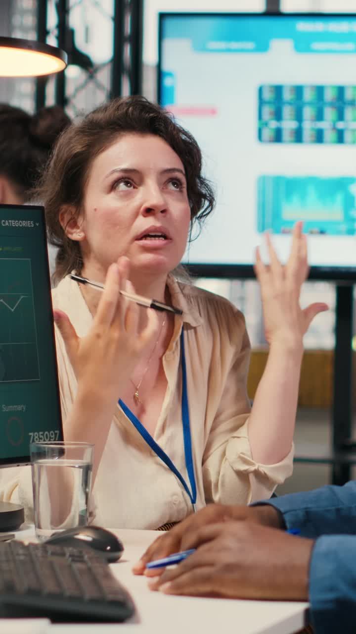 Vertical Video Woman team leader being exasperated due to work pressure and chaos