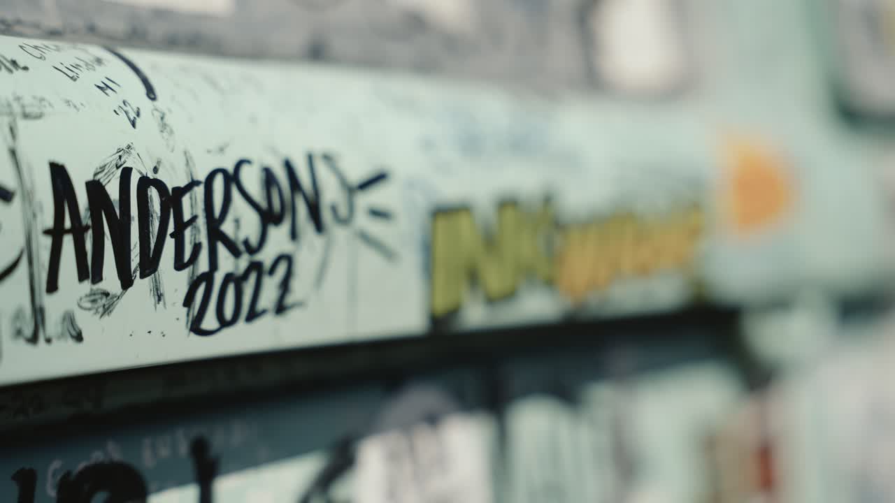 A bus full of graffiti and stickers in Seligman, Arizona.This retro-style bus serves as a mobile canvas, showcasing an explosion of creativity and self-expression.