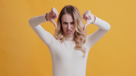 Woman showing thumbs down