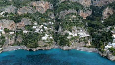 small bridge along amalfi coast with passing traffic