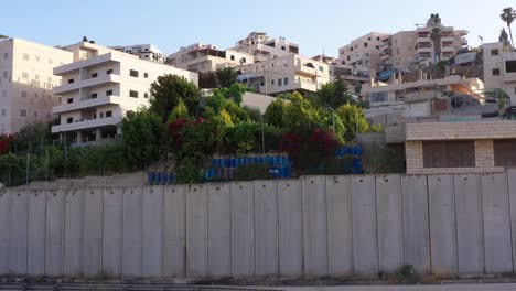 palestine anata refugges camp behind concrete wall -aerial