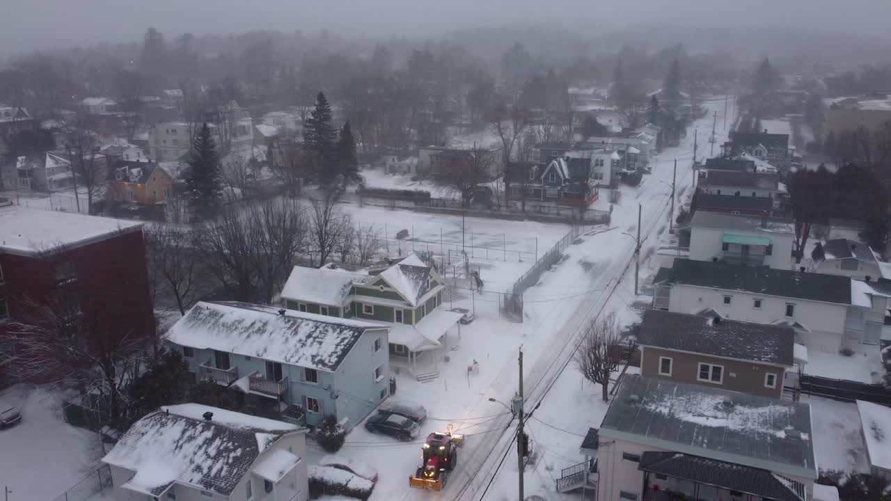 Snow covered suburban neighborhood Canada North America winter aerial drone