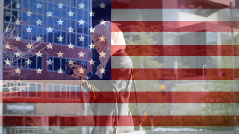 animation of american flag waving with jigsaw puzzles revealing biracial woman in hijab