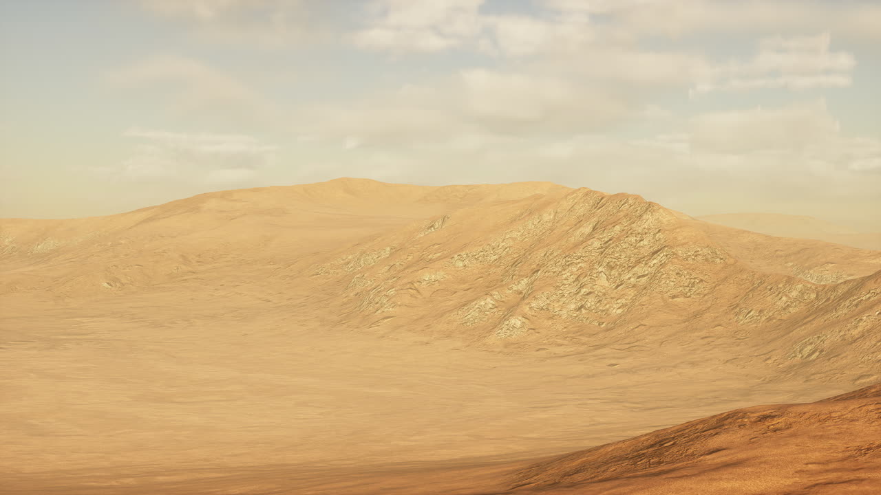 사막의 모래 언덕 위에 해가 지는 것