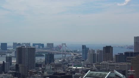 Timelapse,-The-aerial-view-of-the-sea-and-bridge-in-Tokyo