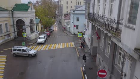 rainy street scene in an old european city