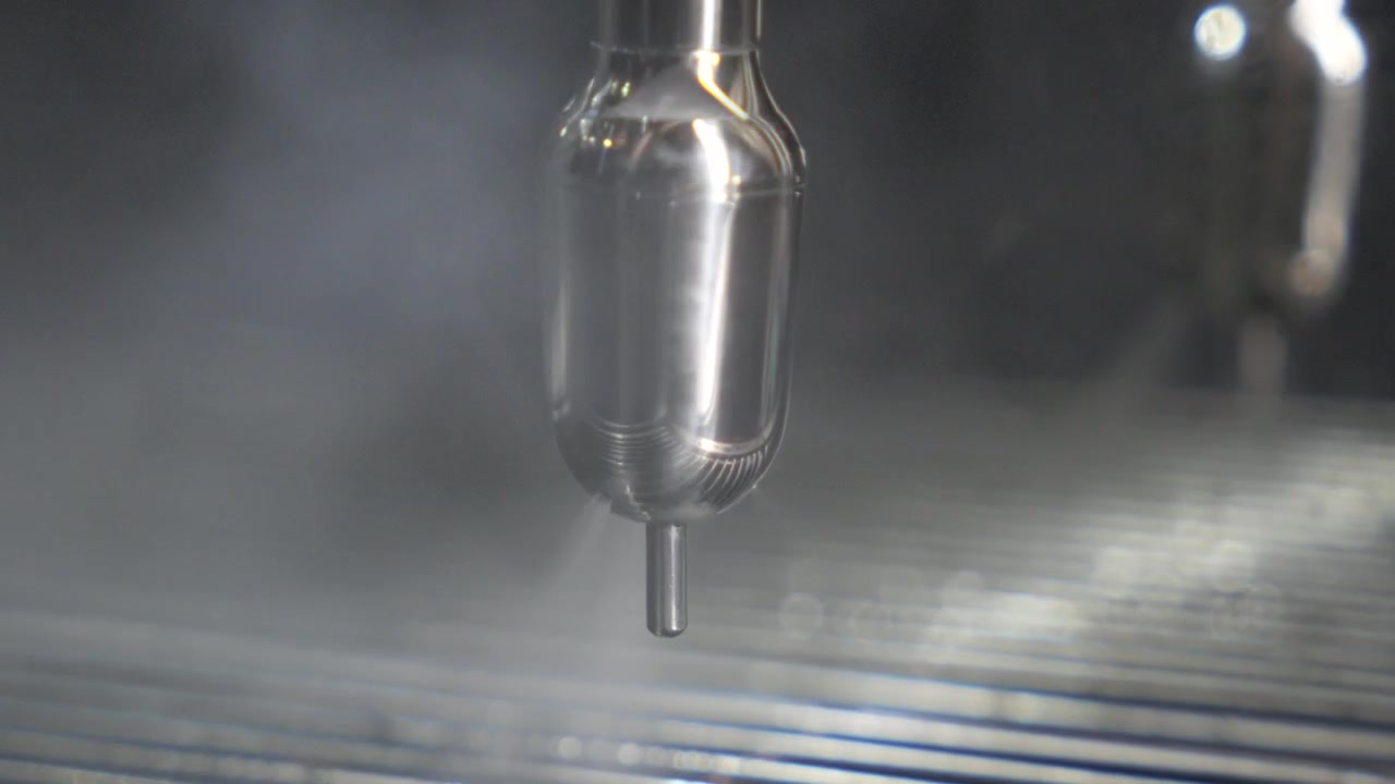 Espresso machine steamer for heating milk. Close up