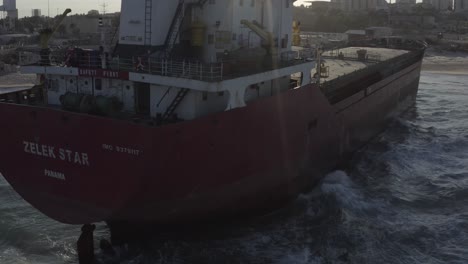damaged cargo ship in distress