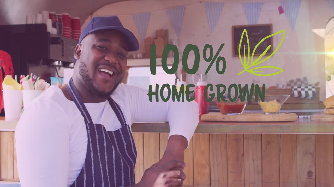 Animazione del testo "100% di produzione locale" su un uomo afroamericano che lavora in un food truck
