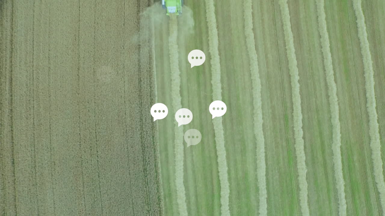 Harvesting field, tractor with animation of chat bubble icons in countryside