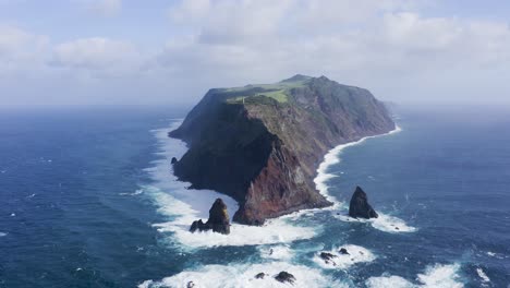 drone footage of dramatic cliffs and rock formations in sao jorge island in the azores, portugal