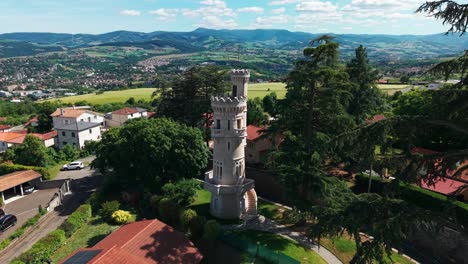 aerial shot over the tower of jealousy in saint martin la plaine in loire departement, auvergne rhone alpes region, france