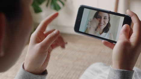 deaf woman woman using smartphone video chatting with best friend communicating with sign language hand gestures enjoying online communication