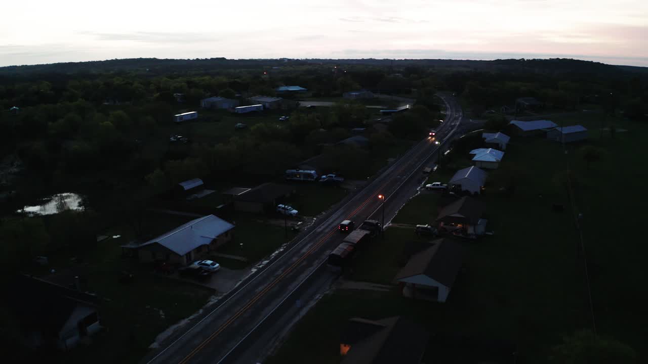 Car driving through town in early morning or evening. Travel concept