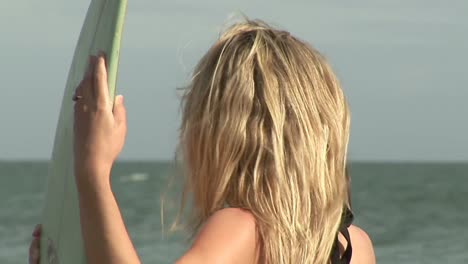 Woman-with-Surfboard