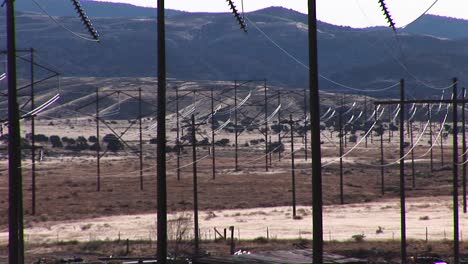 Panright-across-electrical-power-lines-run-across-a-Western-landscape