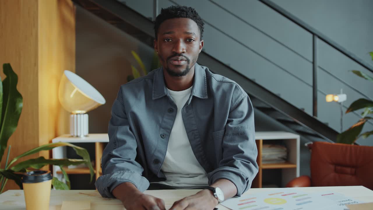 African American Man Talking on Camera during Online Business Meeting
