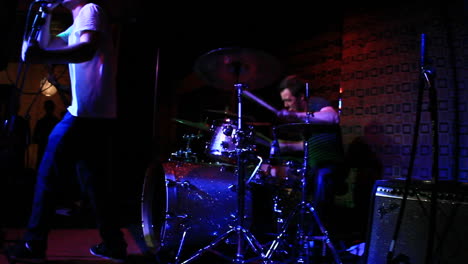 a band performing in a small venue  2