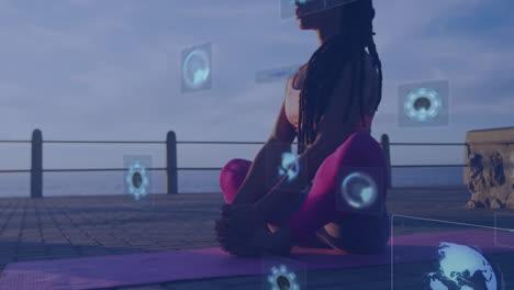 practicing yoga on mat, woman with animation of digital data graphics overlay