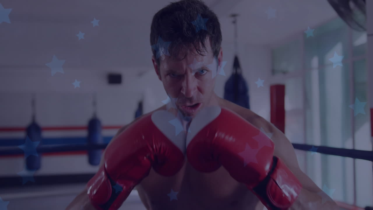 In gym, boxer smiling with animation of stars overlaying scene