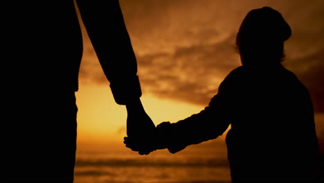 silhouette, father and child holding hands