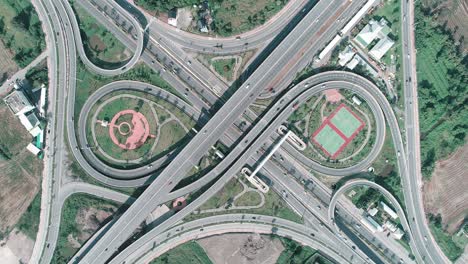 zoom in with aerial view of beautiful highway road for distribution or transportation concept.