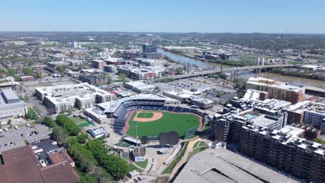first horizon park and city skyline in downtown nashville, tennessee. aerial landscape flyover