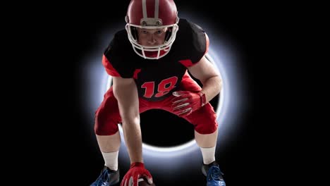 animation of caucasian male rugby player with a ball against glowing ring on black background