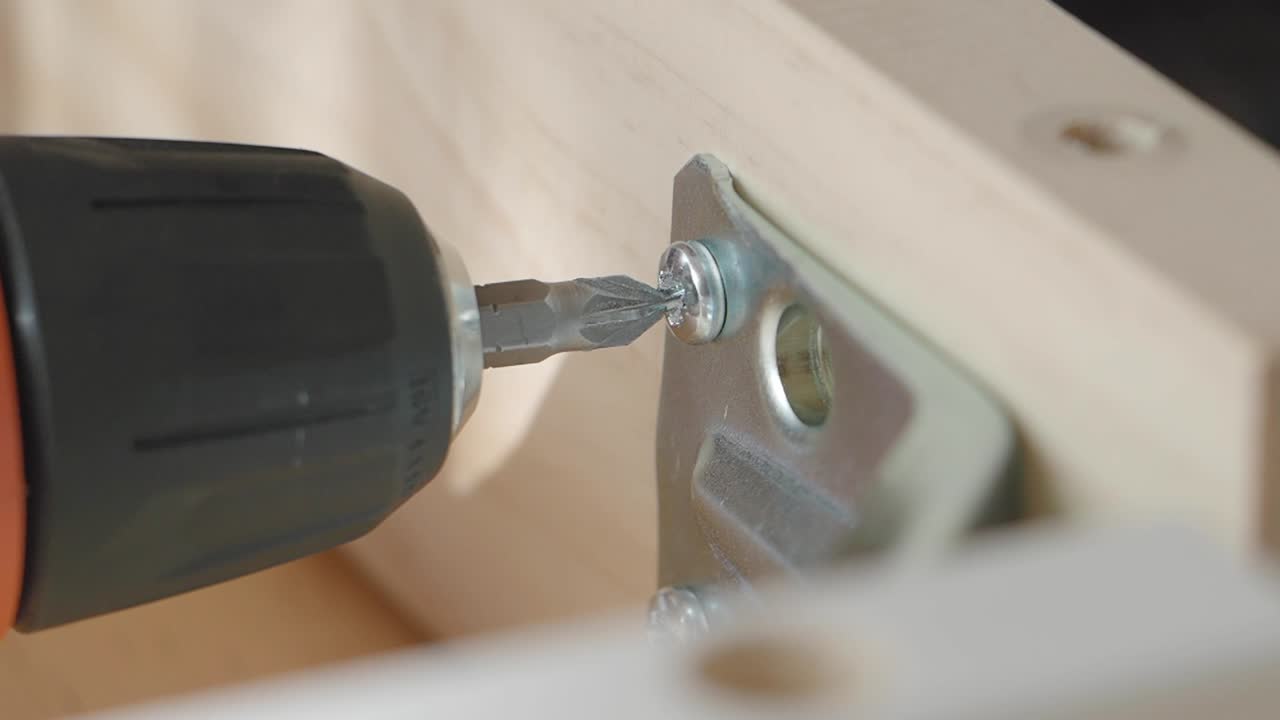 Assembling Furniture: Installing Drawer Bracket