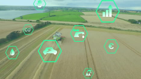 agricultural technology icons animation over aerial view of farmland with harvester