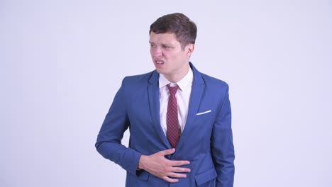 joven y guapo hombre de negocios en traje