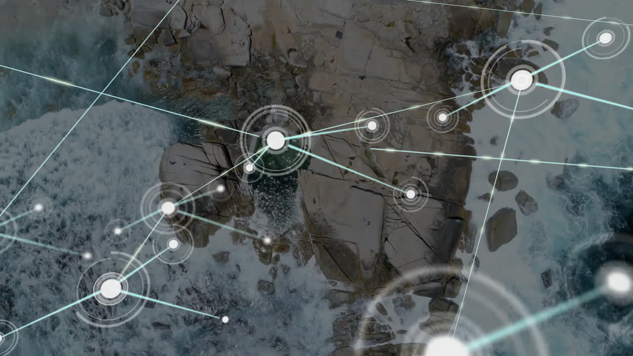 red de conexiones y animación de procesamiento de datos sobre la costa rocosa