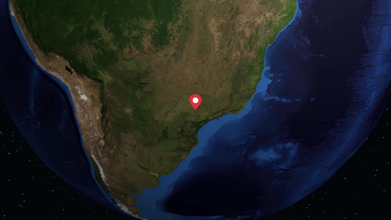 A 3D globe rotates and zooms from space into Bauru, Brazil, with data overlay