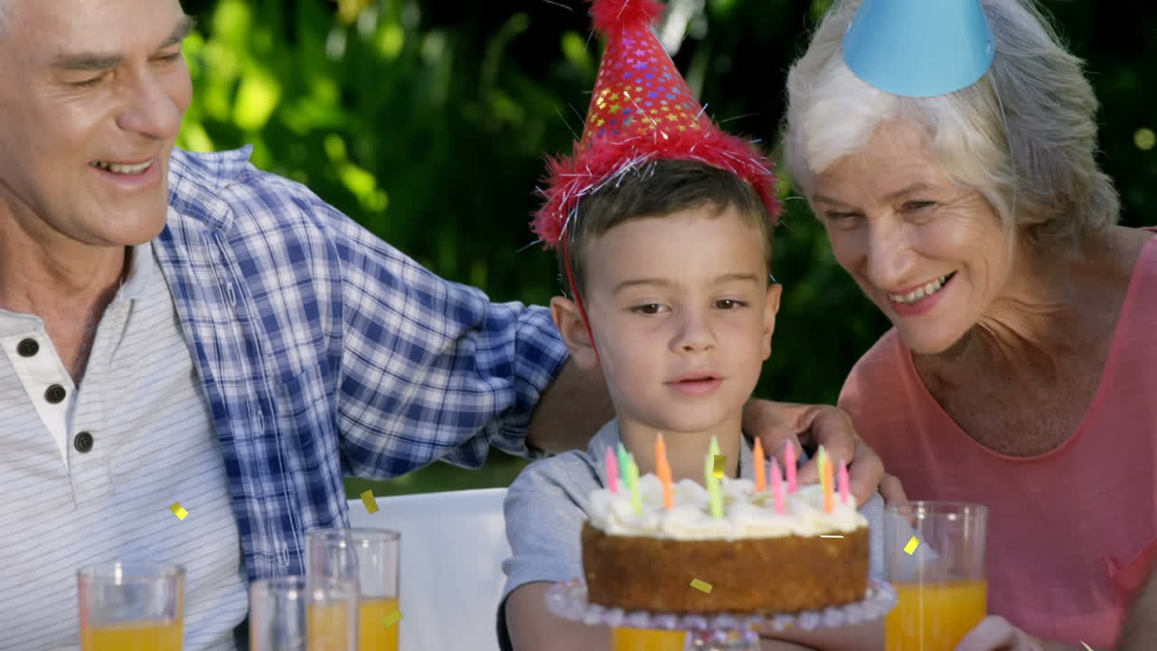 animación de confeti cayendo sobre la familia divirtiéndose en la fiesta de cumpleaños