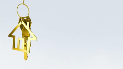 Animation-of-gold-key-with-house-keychain-on-grey-background