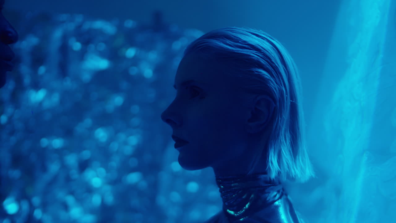 Alien Woman Walking to Man through Laser Light Projection