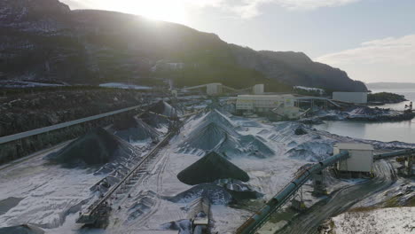 wide angle establishing aerial shot of a mining quarry