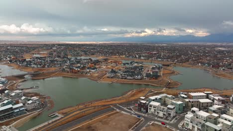 Beautiful-View-of-The-Island-and-Oquirrh-Lake-at-Daybreak-in-South-Jordan-Utah---Establishing-Aerial-Truck-Left-shot