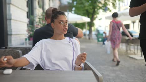 woman having a conversation in a cafe